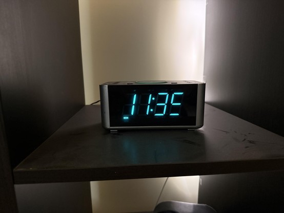 Photo of one of my digital clocks. Reads 11:35, but part of the 5 is missing.