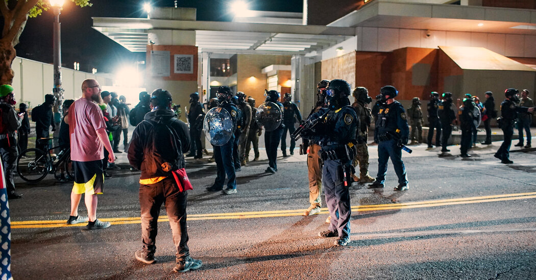 Protesters outside the Immigration and Customs Enforcement building in Portland, Ore., on Sept. 27. President Trump announced earlier that day that he would send troops to Portland to handle what he described as a “War ravaged” city.